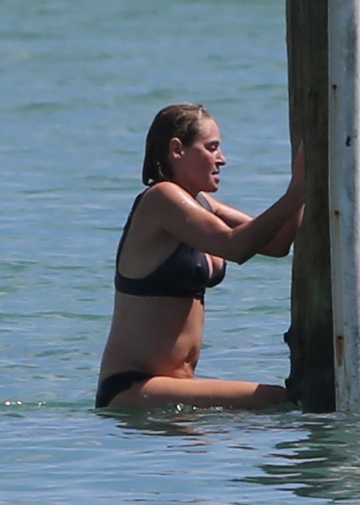 EXCLUSIVE: INF - Uma Thurman Takes A Plunge As She Is Seen Jumping Off A Dock Into The Bay Wearing A Black Bikini In Miami Beach