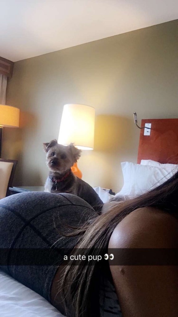 Ariana Grande on a Bed