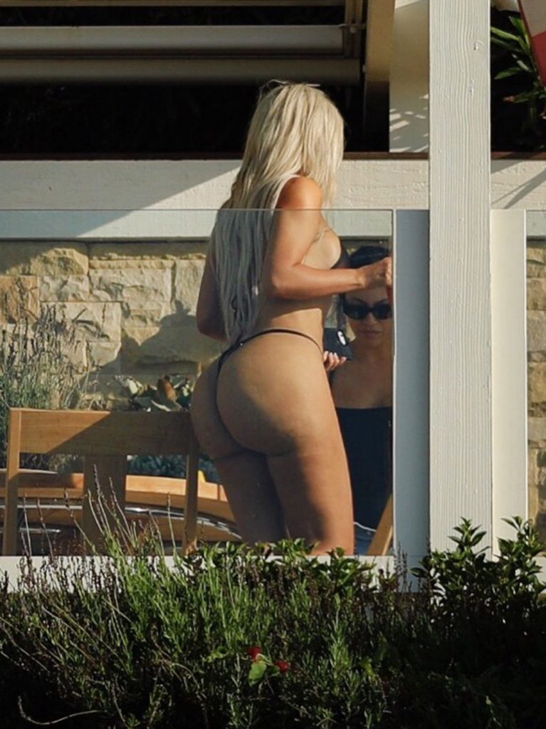 Kim Kardashian disgusting ass in a thong