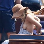 Gillian Anderson had a tit slip showing the world her breast while on vacation in a bikini