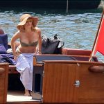 Gillian Anderson had a tit slip showing the world her breast while on vacation in a bikini