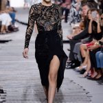 Bella Hadid walking the runway at fashion week