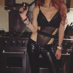 Bella Thorne posing with a knife to her neck