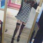 Bella Thorne in a checkered dress