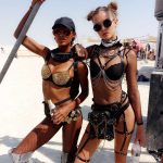 Candice Swanepoel half naked in leather and fish net at Burning Man
