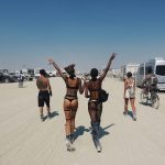 Candice Swanepoel booty out with friend at Burning Man Nevada