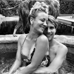 Kaley Cuoco from The Big Bang Theory sitting on a guys lap in a hot tub this weekend