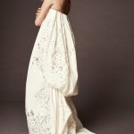Kate Upton in a white sheet dress