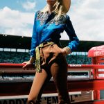 Lara Stone in brown cords and a blue cowgirl shirt