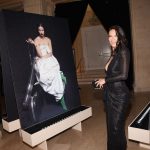 Adriana Lima with her photo at Harpers Bazaar Icons Party