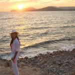 Nicole Scherzinger in all white by the ocean