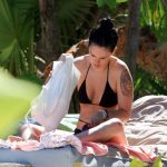 Rumer Willis shows her tattoos on vacation