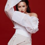 Demi Lovato's in a white sheer outfit