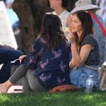 Minka Kelly Stuffing her Face with Pineapple