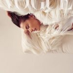 Alessandra Ambrosio wearing a white fur coat
