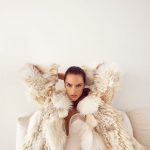 Alessandra Ambrosio sexy pony tail in a white fur coat