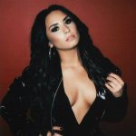 Demi Lovato Tits out of her shirt