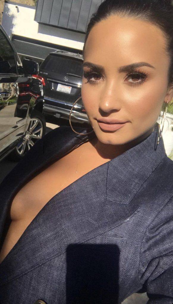 Demi Lovato Cleavage in a Blazer