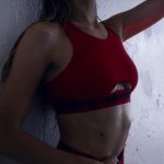 Gigi Hadid Cleavage in a Red Sports Bra