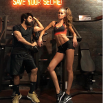 Izabel Goulart in the gym in shorts and a sports bra