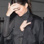 Kendall Jenner in a see through black shirt