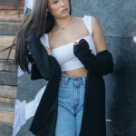 Madison Beer Posing in a White crop top and jeans