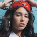 Madison Beer in a red hat in Notion Magazine