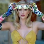 Lili Reinhart in in a yellow cut out dress