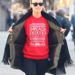 Olivia Wilde Wears a red impeach sweater