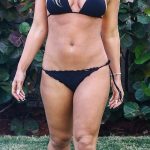 Blonde Brooke Hogan in a tiny black bikini