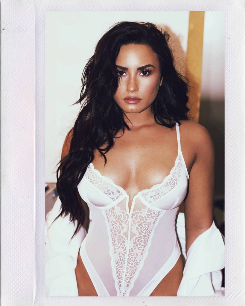 Demi Lovato Sexy White Lace Bodysuit