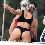 Singer Halsey wears a black bikini and shows some PDA with boyfriend G-Easy on a yacht in Miami