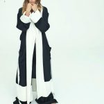 Heidi Klum in a Black and White Coat Harpers Bazaar
