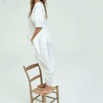 Heidi Klum Stands on a Chair in all White for Harpers Bazaar