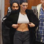 Kendall Jenner pulls her shirt over her boobs no bra