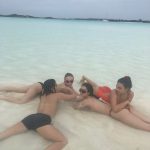 Lily Rose Depp in the water with her posse
