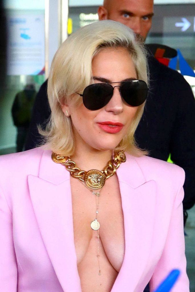 Lady Gaga in Black Sunglasses and no Bra