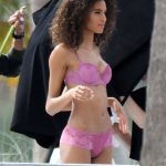 Cindy Bruna poses in a pink bra