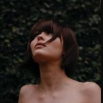 Topless Lily Rose Depp in a short brown bob wig