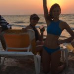 Nina Dobrev in a blue bikini on the beach