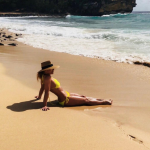 britney spears gets wet in her yellow bikini on the beach