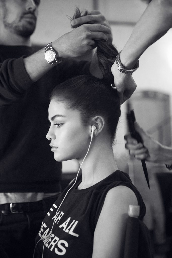 Selena Gomez black and white new face hair being pulled up into a ponytail