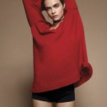 cara delevingne glamour Mexico in a red sweater and black shorts