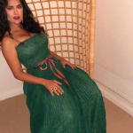 Selma Hayek Big Tits in a Green Dress sitting down