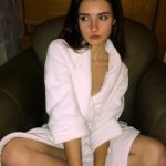 Sarah Curr naked in a robe
