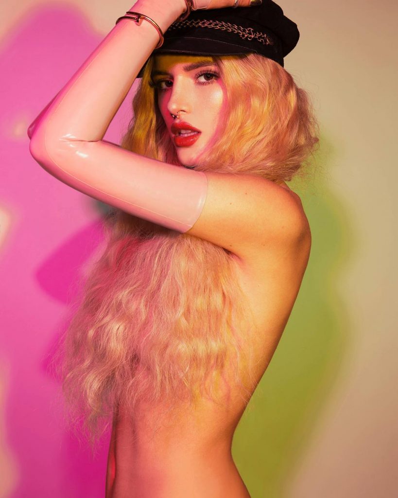 Bella Thorne  naked in a long blonde wig