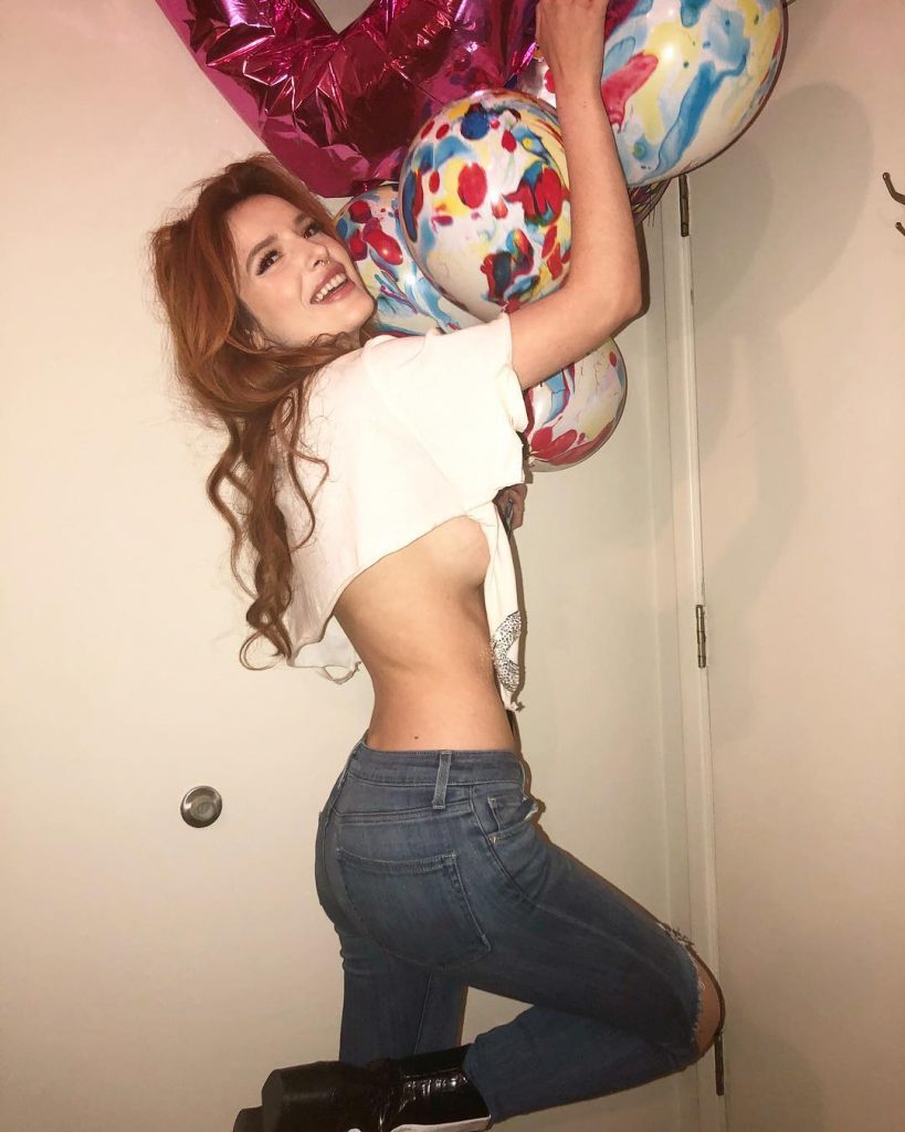 Bella Thorne Tits Out in jeans and white shirt