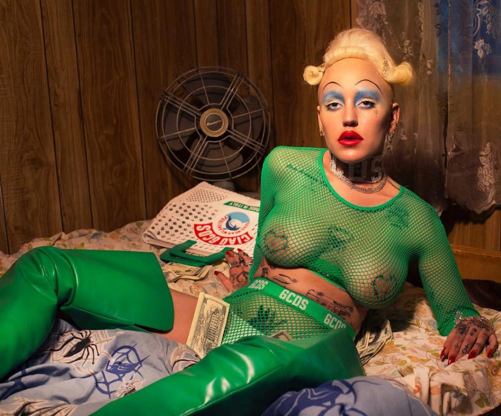 Brooke Candy nipples in a see through green shirt