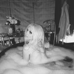 Christina aguilera Looks back at it in the tub