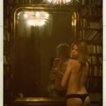Hailey Clauson Topless showing ass in a black thong